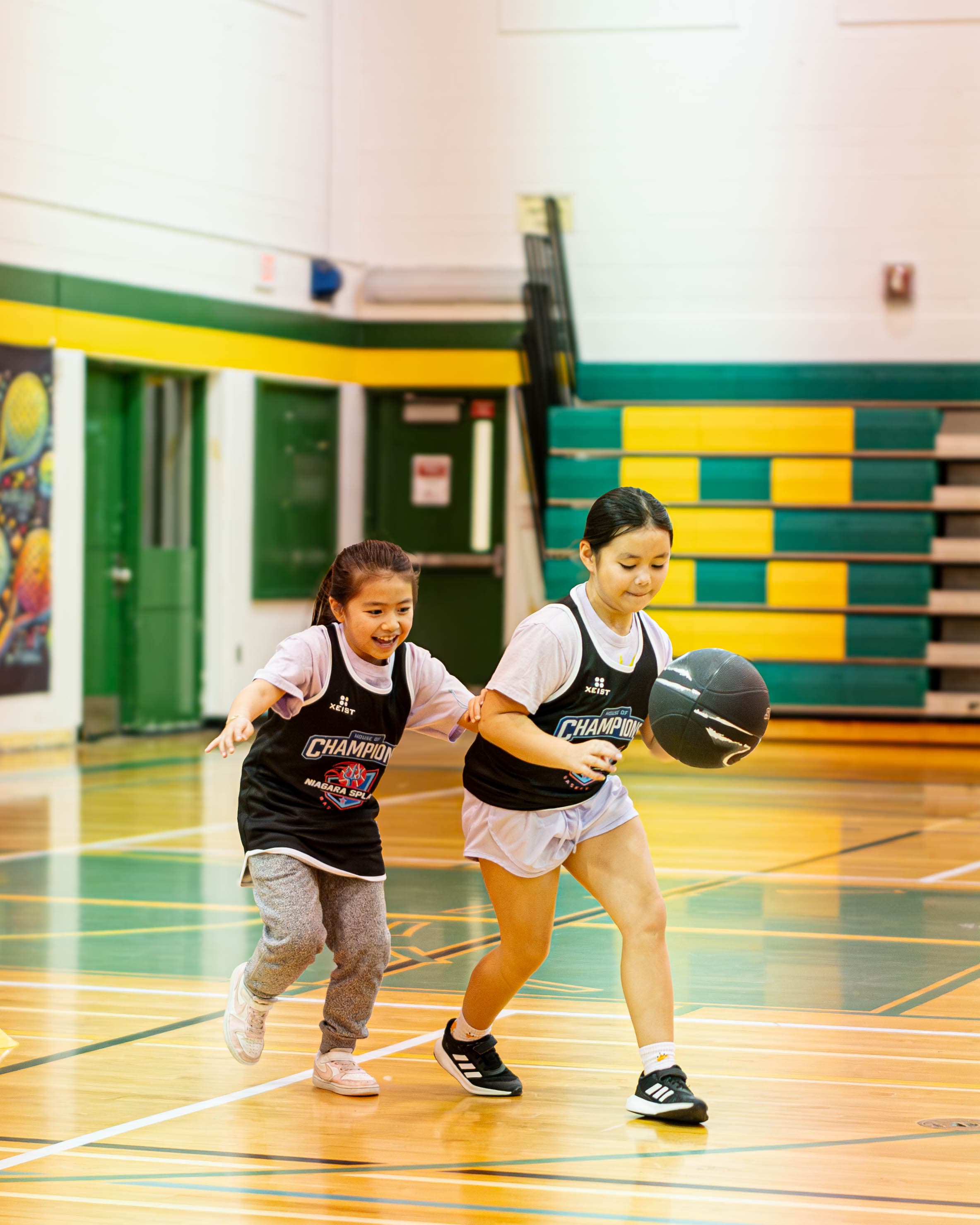 Young athletes playing basketball at Niagara Splash camp